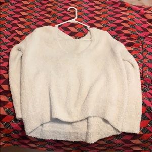white fuzzy sweater